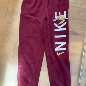 Nike Kids Burgundy Joggers with White Logo